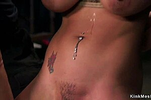 Latina slave feels rough pleasure in bondage threesome.