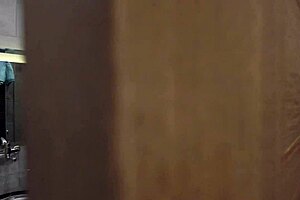 Horny milf gives bathroom blowjob