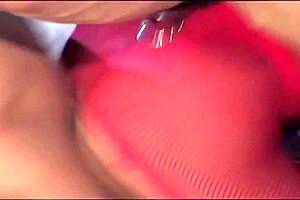 a girl in high heels with fake breasts gets plenty of cum in her mouth