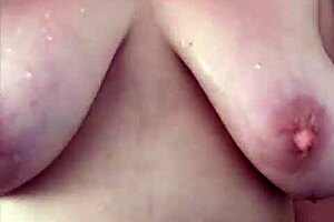 big boob mama showering washing hair and shaving