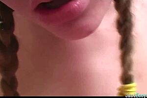 Pigtailed Brunette Plays With Big Tits