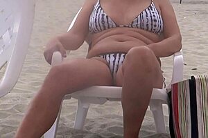 Stepmom shows off creampie at beach.