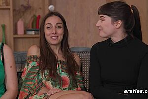 Lesbians playing with various toys in an amateur setting.