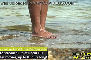 Giggles Rubs Tattooed Feet On Giant Hot Rock At Beach