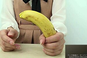 Exclamatory hand crush fetish girl crushes banana by hand in asian japanese softcore food play