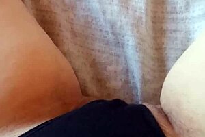 Gretala relaxes in her black slip, feeling sensual