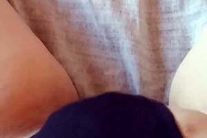 Gretala relaxes in her black slip, feeling sensual