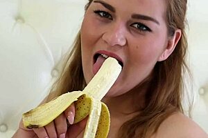 Erin bounces her big boobs while masturbating in bed.