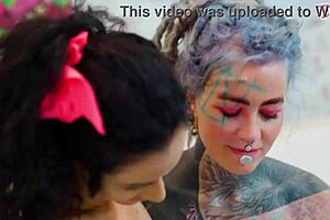 She dives into anal exploration with extreme dildos, fisting her gaping asshole while moaning in sexy tattooed ecstasy.