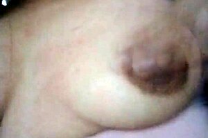 Latina Touches Herself with Small Tits in Grandmother's Living Room During Massage