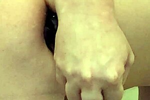 Water Bottle and Dildos Inserted in Ass