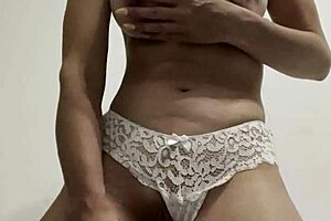 hot wife in white lingerie fucks her pussy with a big dildo