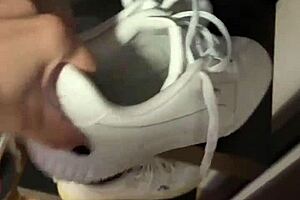 She wakes up early, slipping off her smelly socks to reveal bare feet for fetish fans.