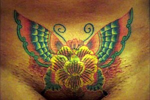 Crystal Butterfly Performs with Music and Tattoos