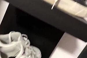 She wakes up early, slipping off her smelly socks to reveal bare feet for fetish fans.