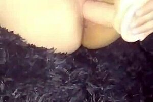 Woman playing in her room with a dildo, detailed solo session