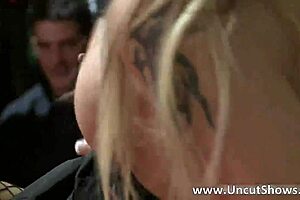 blonde woman rubbing in public