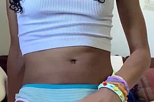 barely legal teen shows puffy pussy, plays with vibrator and panties, so cute in pigtails