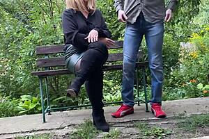 mature milf in sexy clothes helpin a man pee outside
