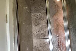 Hidden cam catches hot MILF masturbating.