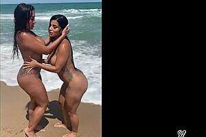 Two Women Share Intimate Moments On The Beach With Kissing And Relaxation