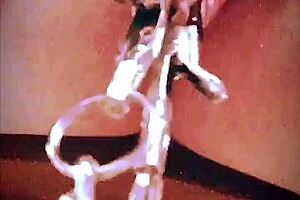 Big pink pussy lips dangled and stretched down with weights