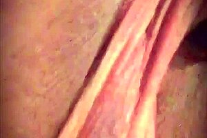 Big pink pussy lips dangled and stretched down with weights
