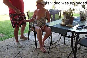 On their first date, the girl next door and her neighbor engage in mutual masturbation outdoors