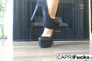 look at capri masturbating in her high heels and showing off her tits