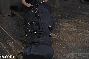 Restrained Girl Receives Punishment in Garage