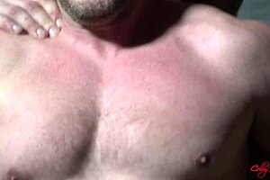 The handsome hunk breeds the trainer anally and makes him cum.