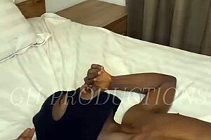 African couple enjoys foreplay