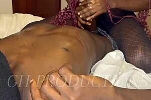 African couple enjoys foreplay