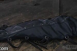 Restrained Girl Receives Punishment in Garage