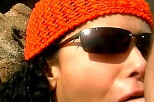 a mature man fucks an exotic babe on seaside stones