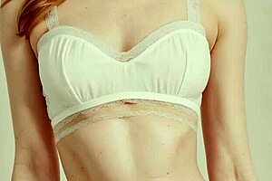 Lingerie models pose in flower panties and barefoot