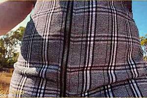 Milf wife flashes shaved pussy in upskirt voyeur scene.