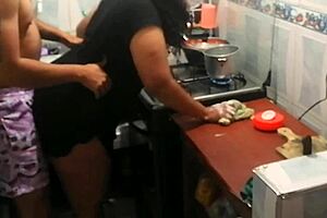 Girlfriend Eats Arepa In Kitchen With Mature Twist