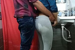 Secretary bent over by boss in office bathroom