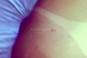 She gets fucked in pussy and ass by big cock, moaning loudly.