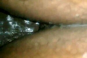 Calmly taking black cock deep into ass