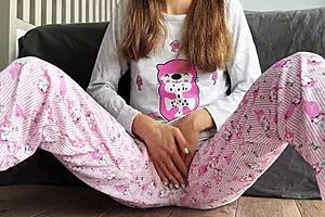 Teen in pajamas masturbates and squirts close up