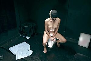 Bound submissive endures blindfolded enema torment in intense BDSM session part 4