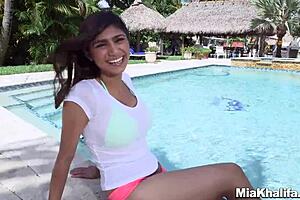 Mia Khalifa chills in the pool with Sean Lawless