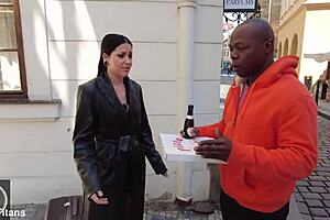 A big butt Italian woman is intensely gangbanged by big black cocks in this group scene.