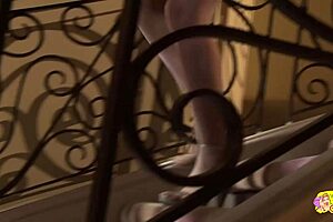 A wonderful couple of blonde lesbians had steamy sex with sex toys on the stairs