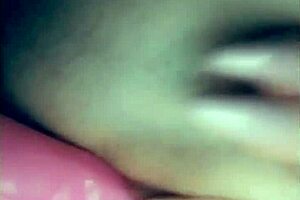 Tight amateur teases her pussy with toys, hinting at more