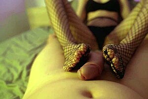 She gave a fishnet footjob and I came on her ass