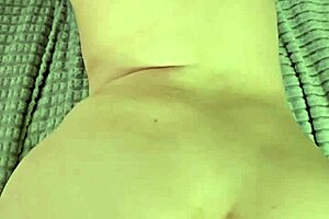 Beautiful Blonde Enjoys Close-Up Solo Moments in Lingerie Bed Scene