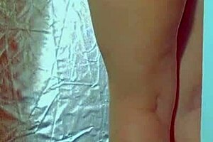 College desi in sexy dress and sneakers masturbates with glass dildo